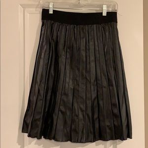 Black faux leather pleated skirt
